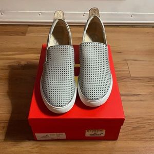 Brand new 9.5 woman’s grey wedges